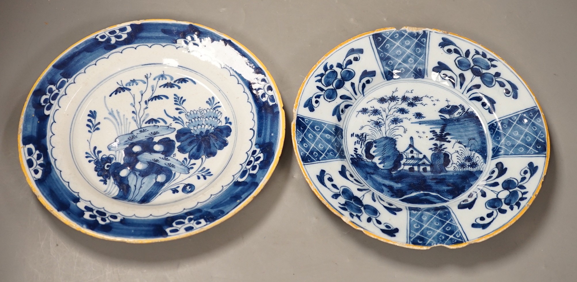 Two 18th century Dutch Delft blue and white plates, largest 23cms diameter